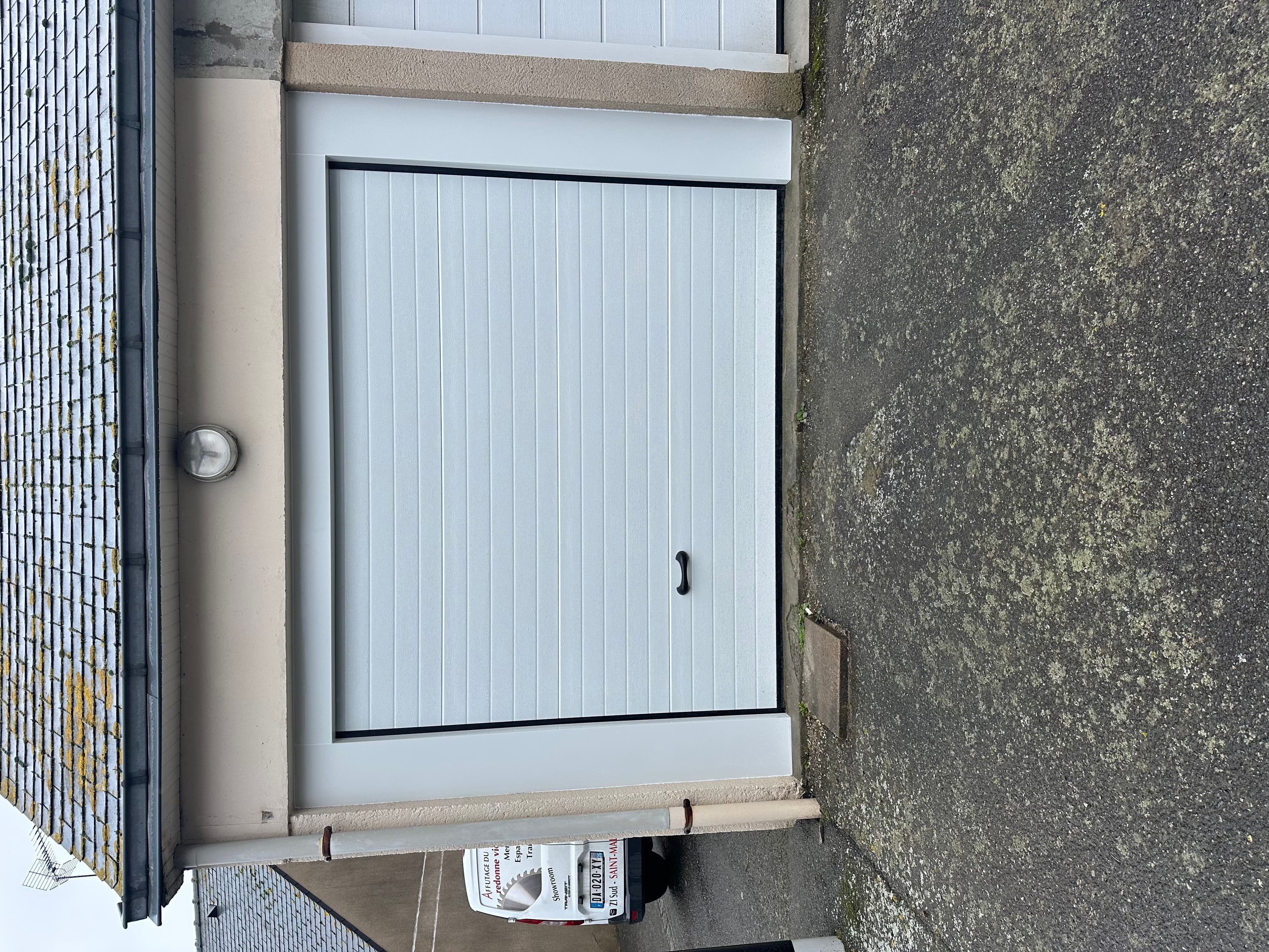 Porte de garage sectionnelle motorisée